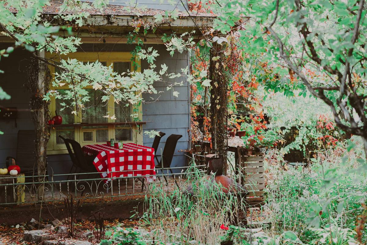 stylish outdoor chairs fireplace setup with fire-resistant rug and weatherproof cushions